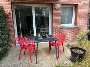 Appartements Beach & Golf Cabourg - 50m2 avec jardin clos a 100m golf Cabourg et 200m plage de Cabourg le Home : photos des chambres