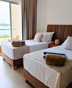 Vista impresionante y cama king en Baia Kristal