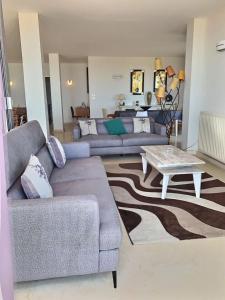 Appartements Magnifique appartement en front de mer : photos des chambres