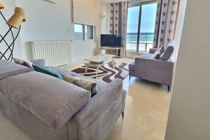 Appartements Magnifique appartement en front de mer : photos des chambres