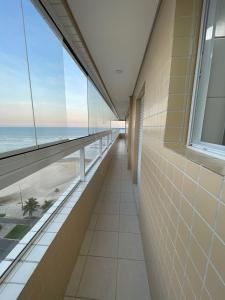 Apartamento grande frente mar