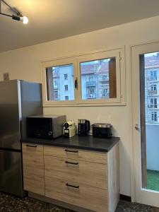 Appartements Coloc Chambre privee meublee dans un appartement lumineux et spacieux : photos des chambres