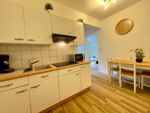 Appartements Appartement avec grand espace vert : photos des chambres