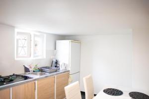 Appartements Appart cosy F2 dans une maison : photos des chambres