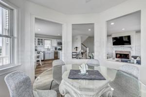 New Listing! Stunning Oceanfront 4-bedroom 3 bath house nestled on the quiet end of the island.