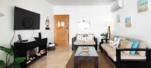 AMARE beach front apartment overlooking pool