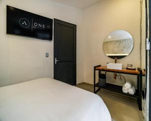 One Apartments Lleras