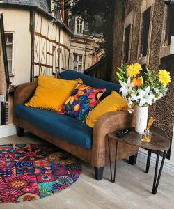 Les Volets Bleus - Deux appartements et un studio, Jardin : photos des chambres