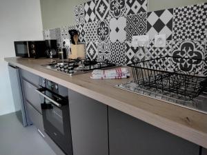 Maisons de vacances L Essentiel Studio climatise A pied Riviere, Marche,Voie Verte : photos des chambres