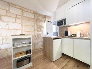 Appartements Les remparts Aigues-Mortes appartement et parking : photos des chambres