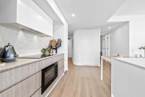 Stylish 2-Bed Apartment with Rooftop BBQ Access