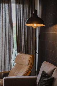 Warta River Deluxe Apartment by BookingHost