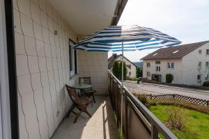 Ferienwohnung Auf dem Hügel mit Balkon