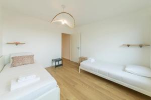 Appartements Baudelaire - Beau 2 chambres - Parking/Plage 400m : photos des chambres