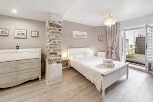 Appartements Tassigny - Charmant appartement/ terrasse - Port : photos des chambres