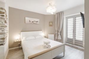 Appartements Tassigny - Charmant appartement/ terrasse - Port : photos des chambres