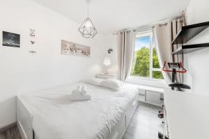 Appartements Le Prevert, T3 avec terrasse et parking : photos des chambres