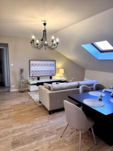 Appartements Superbe appart sur la place : photos des chambres