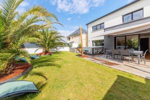 Maisons de vacances Les Alizes - Maison 4 chambres - Jacuzzi/Sauna : photos des chambres