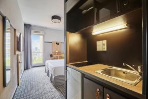 Appart'hotels Appart'hotel Odalys City - Bioparc Lyon Est : photos des chambres
