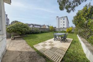 Appartements Le Green, appartement renove, 4 chambres et jardin : photos des chambres