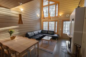 Tunnelmallinen ski-in,out-huvila