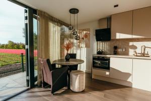 Bos, duin en strand huisje