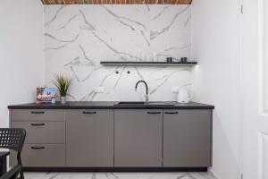 Cozy Studios in the Old Town of Kraków by Noclegi Renters