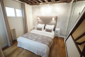 Appartements Louvre Parisian Duplex : photos des chambres