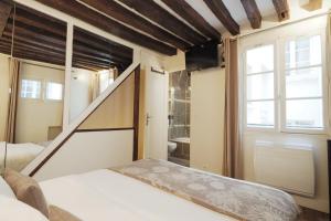Appartements Louvre Parisian Duplex : photos des chambres