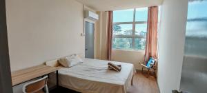 5 Loaves & 2 Fishes Roomstay Opposite GH