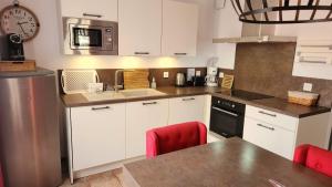 Appartements Maison T3, quartier des peintres, calme et standing, patio prive, clim et wifi : photos des chambres