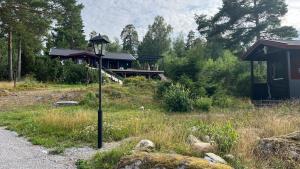 Mysig timmevilla med sjöutsikt