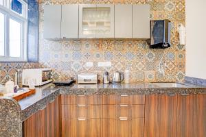 ELIVAAS Irene Ruby 6-BHK Retreat with Private Pools, Gardens, and Balconies