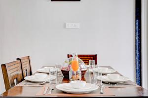 ELIVAAS Irene Ruby 6-BHK Retreat with Private Pools, Gardens, and Balconies