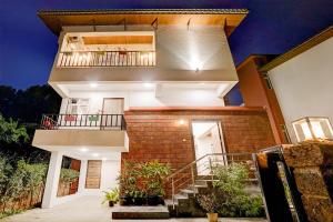 ELIVAAS Irene Ruby 6-BHK Retreat with Private Pools, Gardens, and Balconies