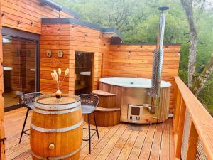 Appartements La Cabane du Prestadou - Bain nordique et Sauna : photos des chambres