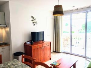 Appartements Appt T4 Residence Le Cordouan 3 etoiles cote Piscine : photos des chambres