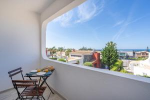 Seaside Charm Flat w Balcony by HostWise