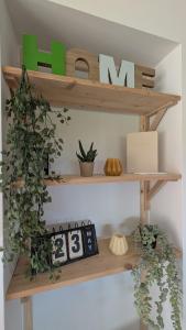 Appartements Appartement cosy avec jardin : photos des chambres