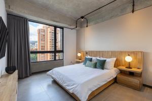 Apartmanto de diseño moderno y elegante de 2 habitaciones con AC, piscina, gimnasio y vistas a El Poblado