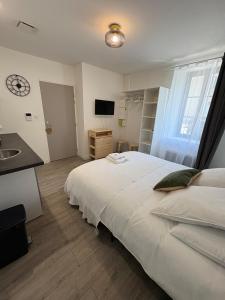 Appartements Studio : photos des chambres