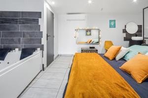 Appartements Retro Game Room avec jacuzzi : photos des chambres