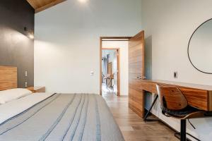 Cabaña de lujo 2 habitaciones con Jacuzzi Dentro del Bosque a 10 min del Pueblo