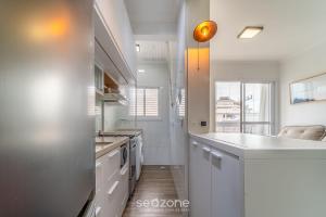Apto c varanda gourmet a 800m da praia CBE0201