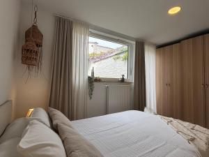 Appartement lumineux avec jardin proche du centre