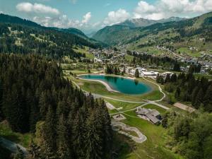 Appartements Le pied des pistes, studio 5 pers, balcon sud est, vue sur les montagnes : photos des chambres