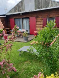 Maisons de vacances La cabane au fond du jardin : photos des chambres