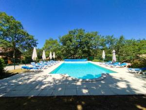 Maisons de vacances L-Auzacoise, chalet tout confort pour un sejour inoubliable : photos des chambres