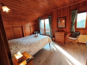 Maisons de vacances L-Auzacoise, chalet tout confort pour un sejour inoubliable : photos des chambres